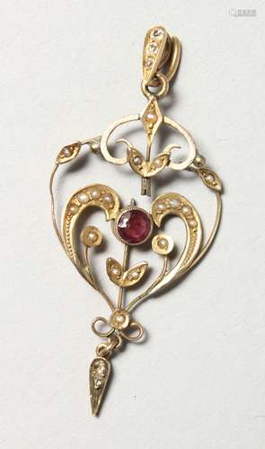 AN EDWARDIAN GOLD AND SEED PEARL PENDANT.