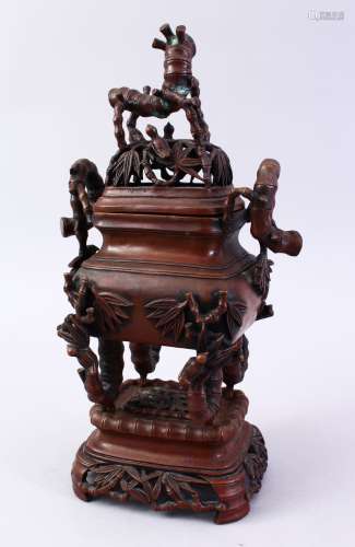 A CHINESE BRONZE LIDDED CENSER & COVER, The censer formed in bamboo style, with an openwork lid