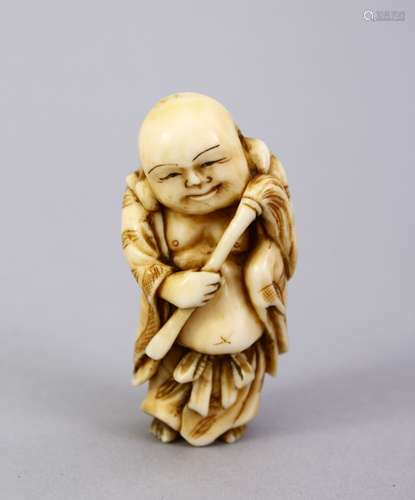 A JAPANESE MEIJI PERIOD CARVED IVORY OKIMONO OF HOTEI, the small carved figure depicting hotei