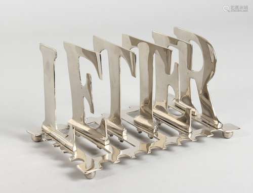 A LARGE SILVER-PLATED LETTER RACK. 8ins long.