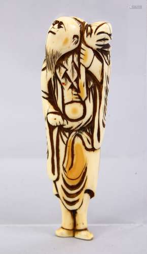 A LARGE JAPANESE EDO PERIOD CARVED IVORY NETSUKE OF A SENNIN, stood looking aloft holding a sack