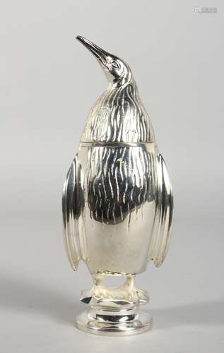 A PENGUIN SUGAR SIFTER. 7ins high.