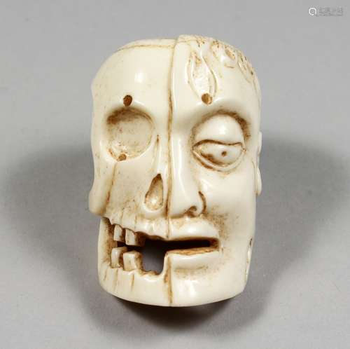 A CARVED BONE HALF NAPOLEON AND SKULL WALKING STICK HANDLE. 2ins.