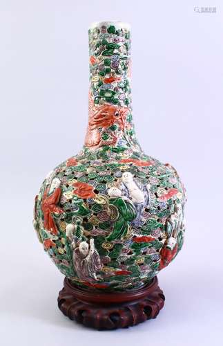 A GOOD CHINESE FAMILLE VERTE RETICULATED IMMORTAL VASE, the vase with openwork stylized clouds