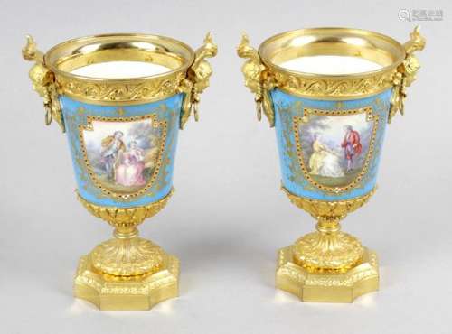 A pair of Sevres style porcelain gilt metal mounted twin handled vases,