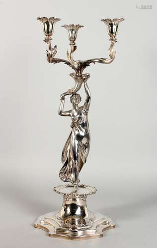 A GOOD VICTORIAN SILVER TABLE CENTRE CANDELABRA, with three scrolling branches emanating from a