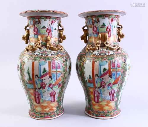 A GOOD PAIR OF 19TH CENTURY CANTON FAMILLE ROSE PORCELAIN VASES, each vase with panel decoration