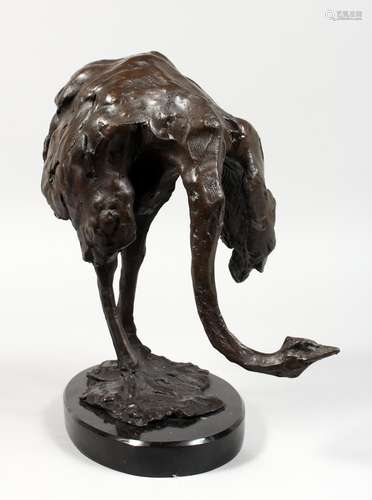 AFTER FREMIER A LARGE BRONZE FIGURE OF AN OSTRICH. Signed, on an oval black marble base. 14ins