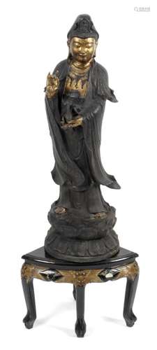 A large bronze study of Guan Yin,