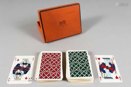 TWO PACKS OF HERMES PLAYING CARDS, in an original Hermes box.