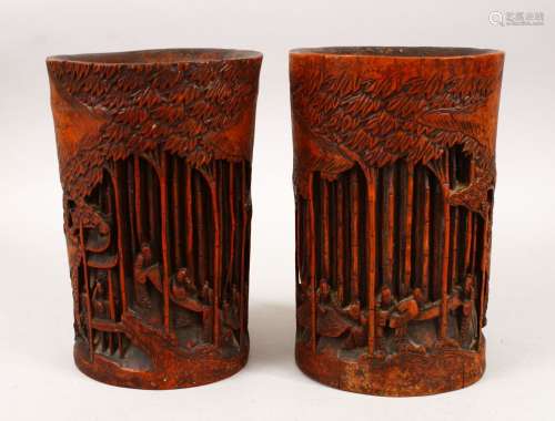 A GOOD PAIR OF 19TH CENTURY CHINESE BAMBOO BRUSH POTS, each decorated in relief to depict working