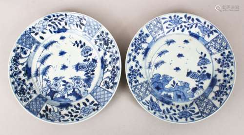 A GOOD PAIR OF 18TH CENTURY CHINESE BLUE & WHITE PORCELAIN PLATES, each with panel decoration