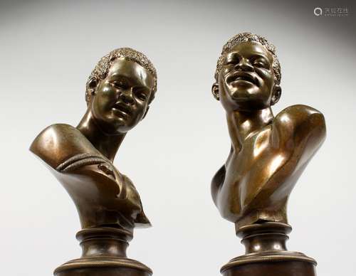 A SUPERB PAIR OF REGENCY BRONZE BUSTS OF MEN ON PEDESTAL BASES. 11ins high.