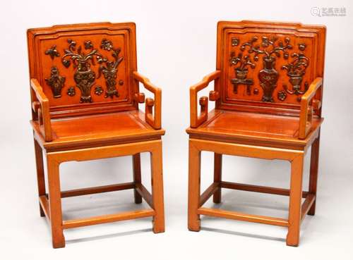 A GOOD PAIR OF CHINESE HARDWOOD & LACQUER CARVED ARM CHAIRS, the backs with floral display lacquer