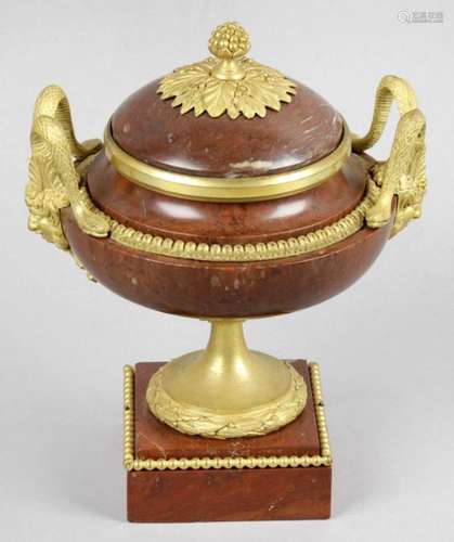 A 19th century rouge marble and gilt metal mounted urn and cover,