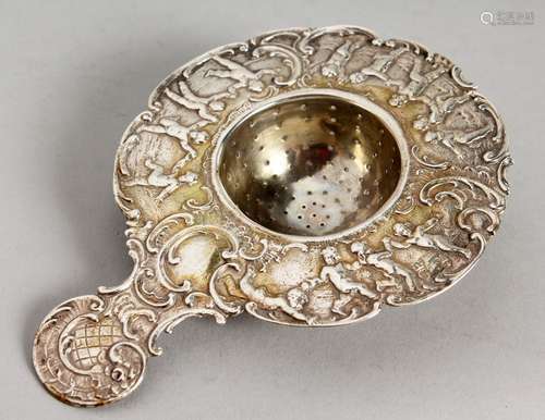 A DUTCH SILVER TEA STRAINER.