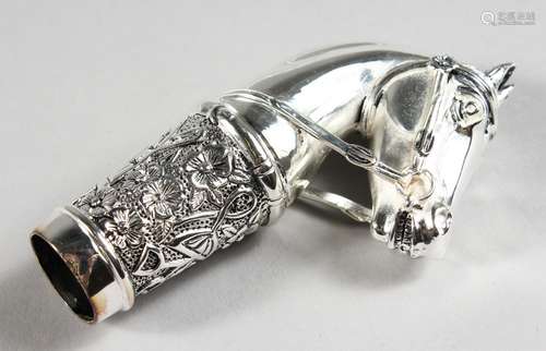 A NOVELTY SILVER-PLATED HORSES HEAD CANE HANDLE. 3.5ins long.