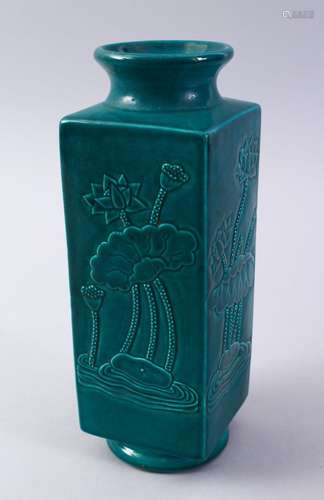 A GOOD CHINESE TURQUOISE GROUND SQUARE FORM PORCELAIN VASE, decorated with side relief panels of