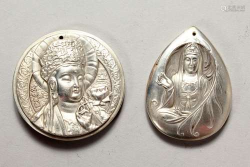 TWO CHINESE WHITE METAL PENDANTS. 2ins high.