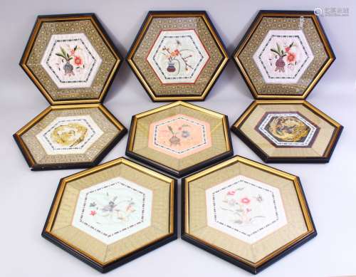 EIGHT CHINESE 19TH / 20TH CENTURY EMBROIDERED SILK PANELS - FRAMED, of hexagonal form, each with
