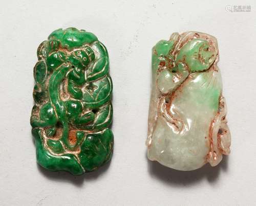 TWO CHINESE CARVED JADE PENDANTS. 2ins and 2.25ins high.