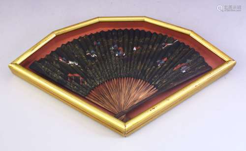 A GOOD 19TH / 20TH CENTURY FRAMED CHINESE WOOD AND PAINTED PAPER FAN, the fan decorated with