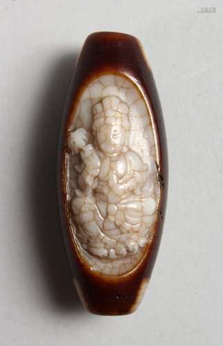 A TIBETAN AGATE CARVED BEAD. 2ins long.