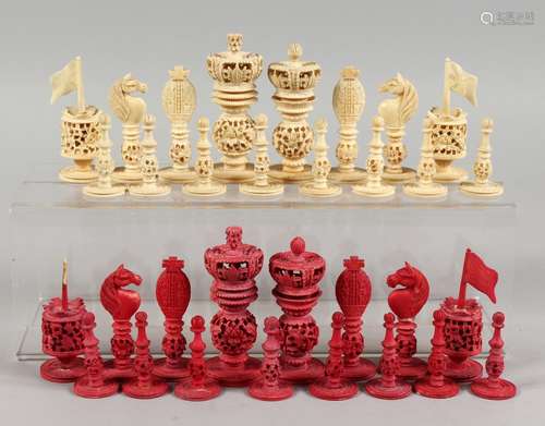 A GOOD SET OF CHINESE CARVED AND PIERCED IVORY CHESS MEN. King: 3.5ins high.