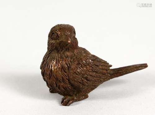 A JAPANESE BRONZE MODEL OF A BIRD. 2ins long.