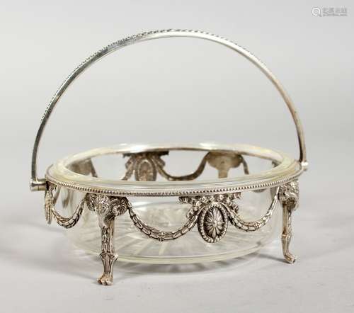 A VICTORIAN CUT GLASS SILVER FRAMED BUTTER DISH, 5ins diameter, with bead edge, garlands and rams