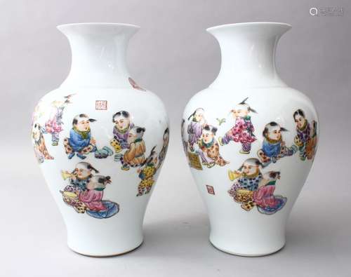 A PAIR OF CHINESE REPUBLIC PERIOD FAMILLE ROSE PORCELAIN VASES OF BOYS PLAYING, the body of the