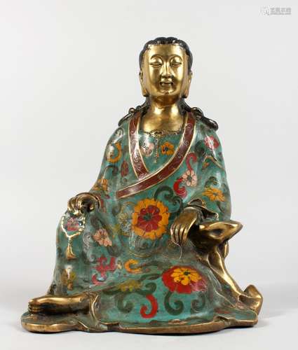 A CHINESE CLOISONNE SEATED FIGURE. 10ins high.