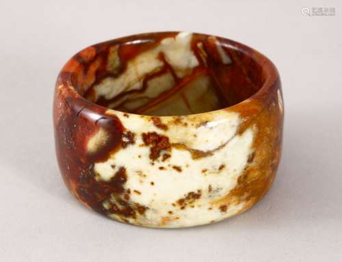 A 19TH / 20TH CENTURY CARVED CHINESE SOAP / HARD STONE BANGLE, 8cm diameter, 6.3cm internal.