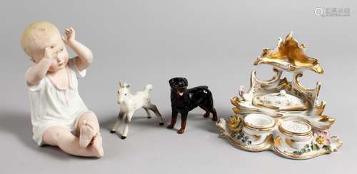 A BISQUE PORCELAIN SEATED BABY, a porcelain inkwell, a Beswick dog and Beswick horse.