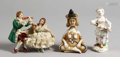 A SMALL PORCELAIN FIGURINE OF A GIRL HOLDING A LUTE, a porcelain conversation group and a seated