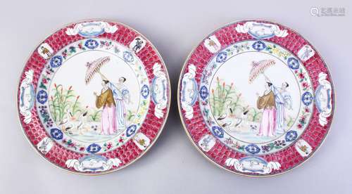 A GOOD PAIR OF CHINESE FAMILLE ROSE PORCELAIN PLATES, both decorated in a similar style depicting