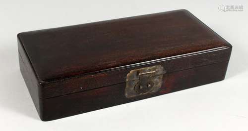 A CHINESE RECTANGULAR PLAIN HARDWOOD BOX. 12.5ins long.