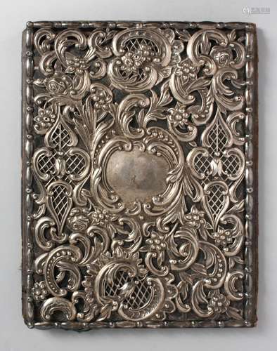 A REPOUSSE AND PIERCED SILVER MOUNTED PHOTO ALBUM. London 1910.