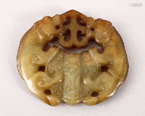AN UNUSUAL 19TH / 20TH CENTURY CHINESE CARVED JADE PENDANT - COAT OF ARMS STYLE, carved in the