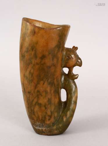 A 20TH CENTURY CHINESE CARVED SOAPSTONE LIBATION CUP, carved with a handle depicting phoenix, 14cm.