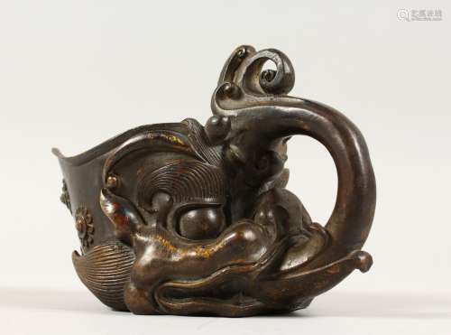 A GOOD CHINESE ARCHAIC STYLE BRONZE LIBATION CUP, cast as a dragon with flames from its mouth