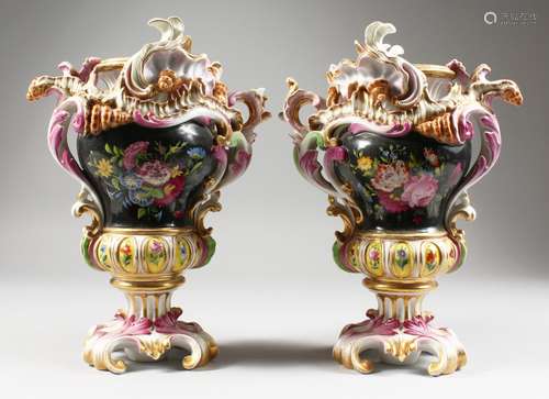 A GOOD PAIR OF FRENCH PORCELAIN VASES, with scrolls, painted with reverse panels of flowers on a