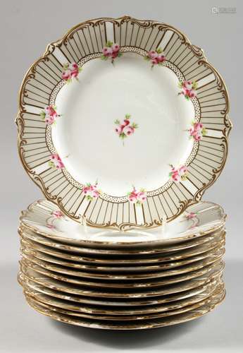 A SET OF THREE PLATES, sprigged with roses. 9ins diameter.