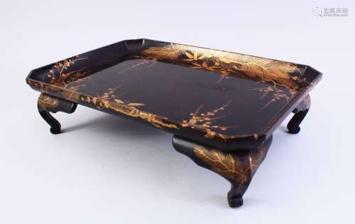 A GOOD JAPANESE MEIJI PERIOD LACQUER TRAY, stood on four feet, the centre decorated with lacquer