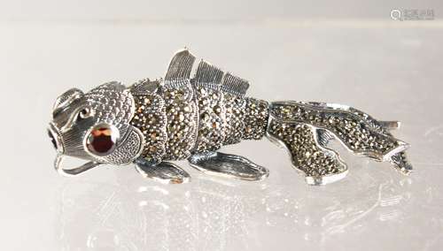 A SILVER AND MARCASITE ARTICULATED FISH BROOCHES.