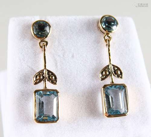 A GOOD PAIR OF 9CT GOLD BLUE TOPAZ DROP EARRINGS.