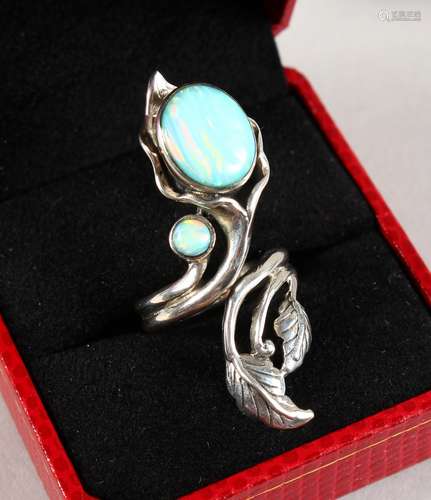 A SILVER AND REAL OPAL NATURALISTIC RING.