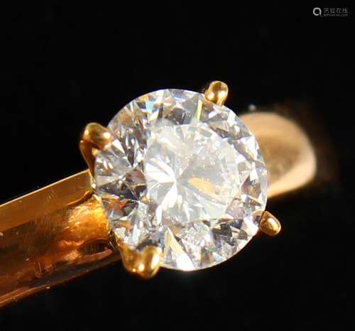 A 22CT GOLD SOLITAIRE DIAMOND RING.