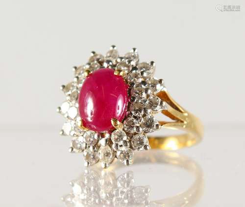 A GOOD RUBY AND DIAMOND OVAL CLUSTER RING, set in yellow gold.