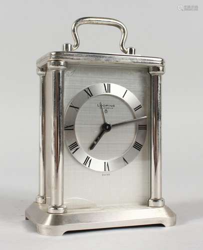 A LOOPING CHROME CARRIAGE CLOCK, with fifteen jewels, Swiss made, No. 1078574, with carrying handle.